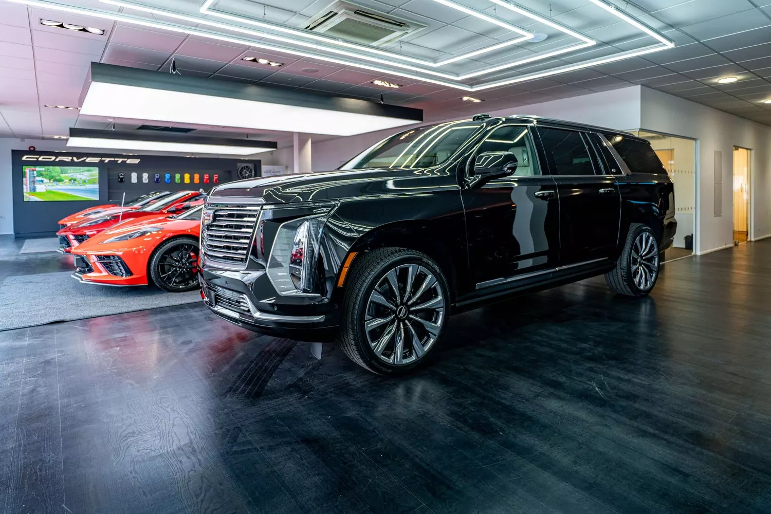 Black Cadillac Escalade displayed inside Grange Birmingham