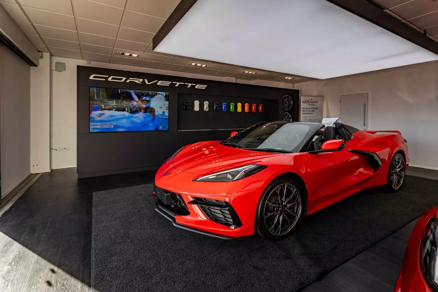 Red Corvette displayed inside the dedicated Birmingham Corvette showroom