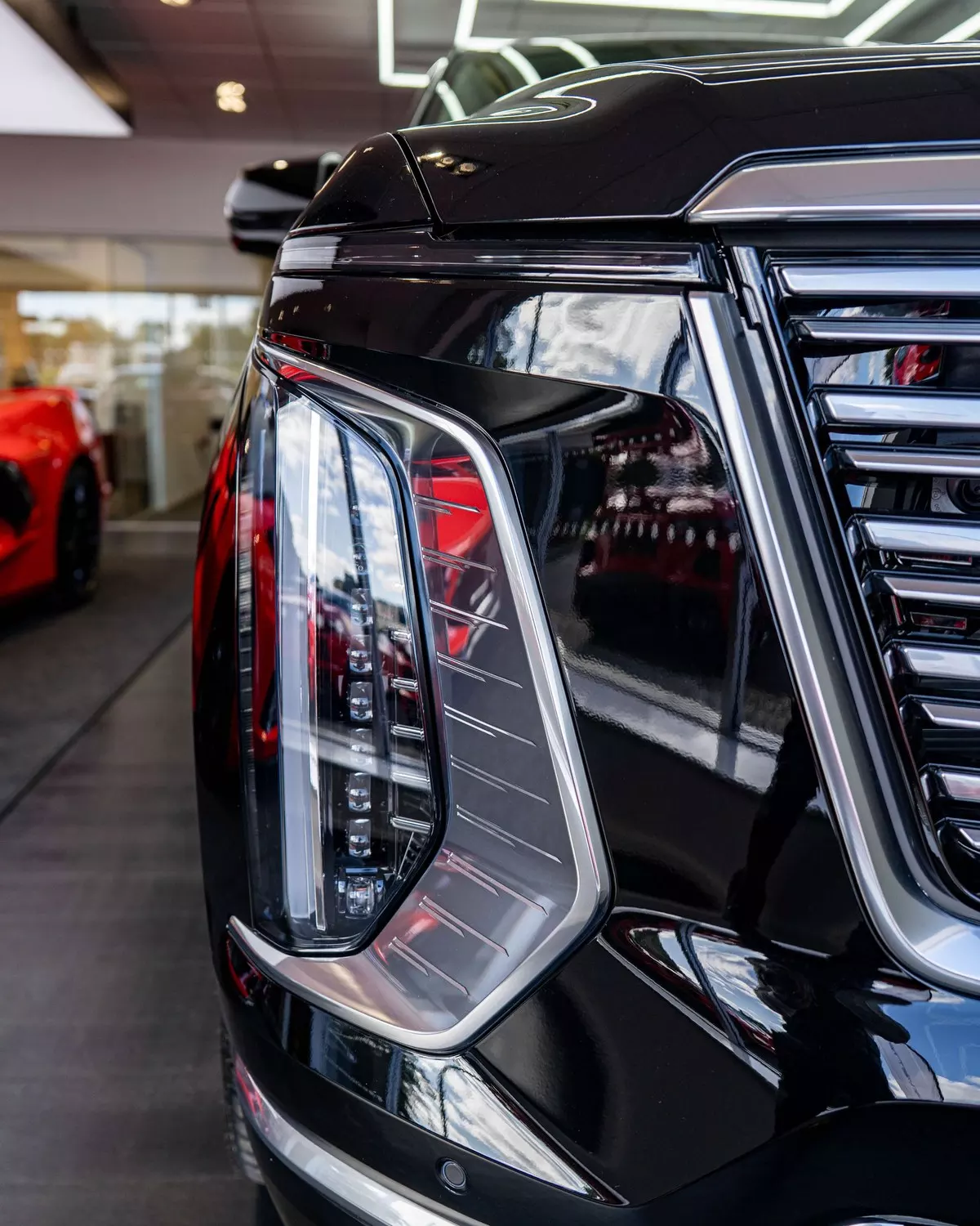 Close-up of the Escalade front lighting and grille