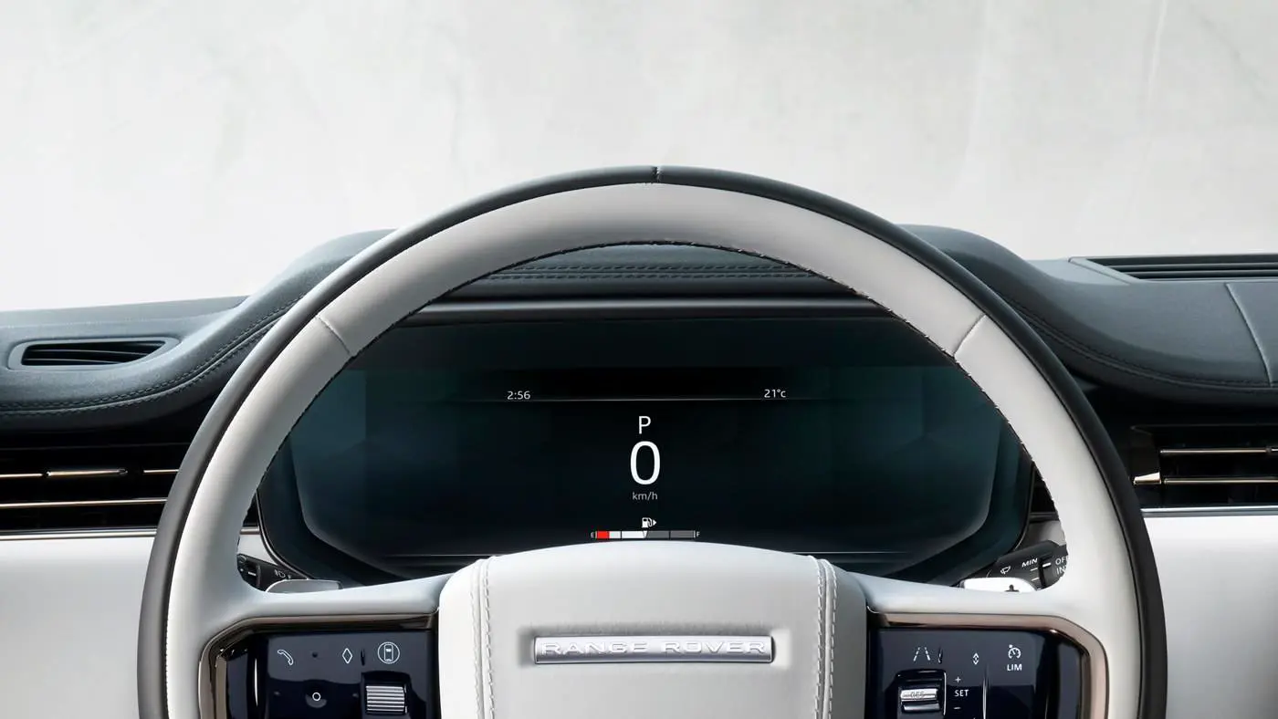 Range Rover Sport steering-wheel illustration. Rear-wheel steering is a separate chassis equipment item, not identifiable from the steering wheel alone.