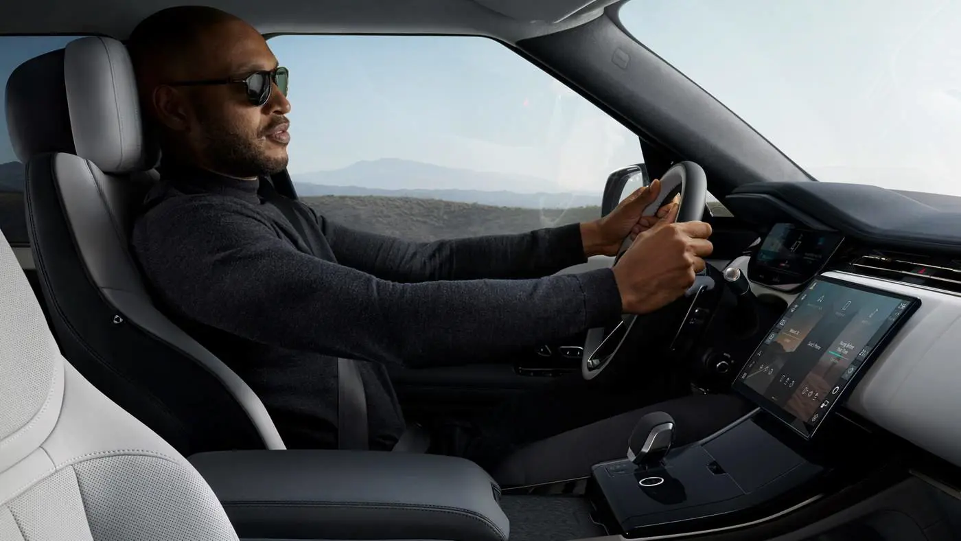 Manufacturer driving-position photograph: assess visibility and controls alongside the chassis specification.