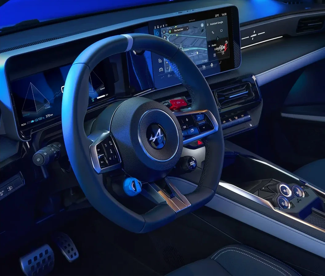 Alpine A290 road-car interior showing its steering wheel and central multimedia display