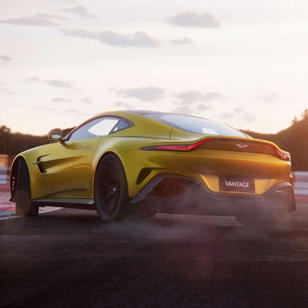 Yellow Aston Martin Vantage road car seen from the rear in official manufacturer imagery