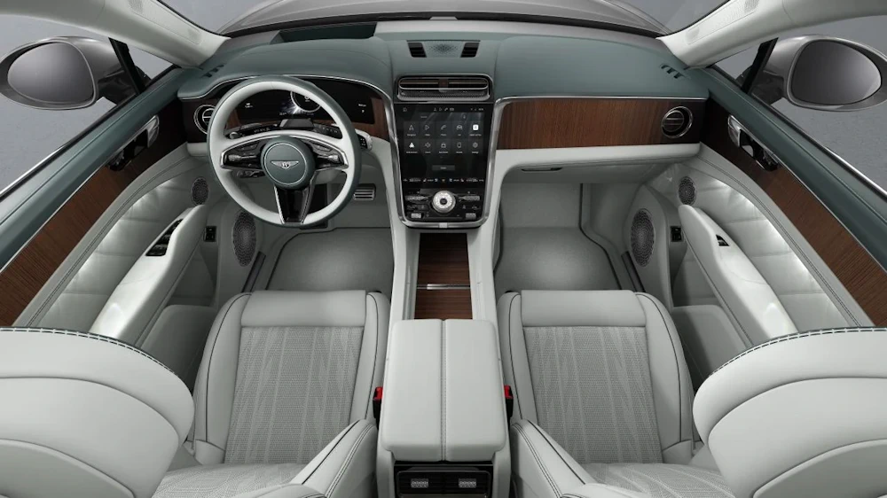Bentley Torcal front cabin with central display, light-coloured seats and veneer trim