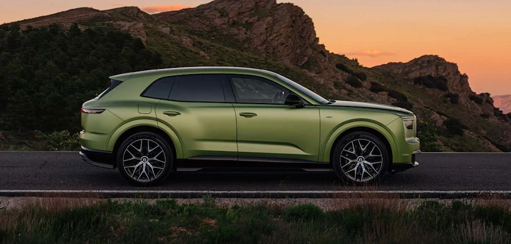 Bentley Torcal S in green viewed from the side at sunset
