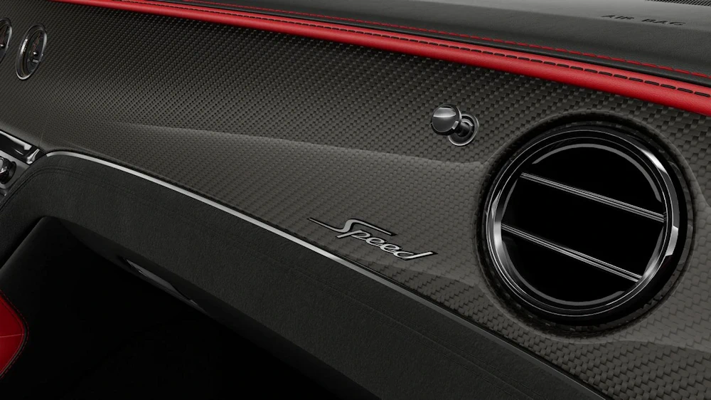 Carbon fibre veneer and Speed badge inside a Bentley Continental GT Speed