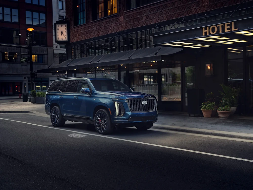 Cadillac Escalade ESV outside a hotel