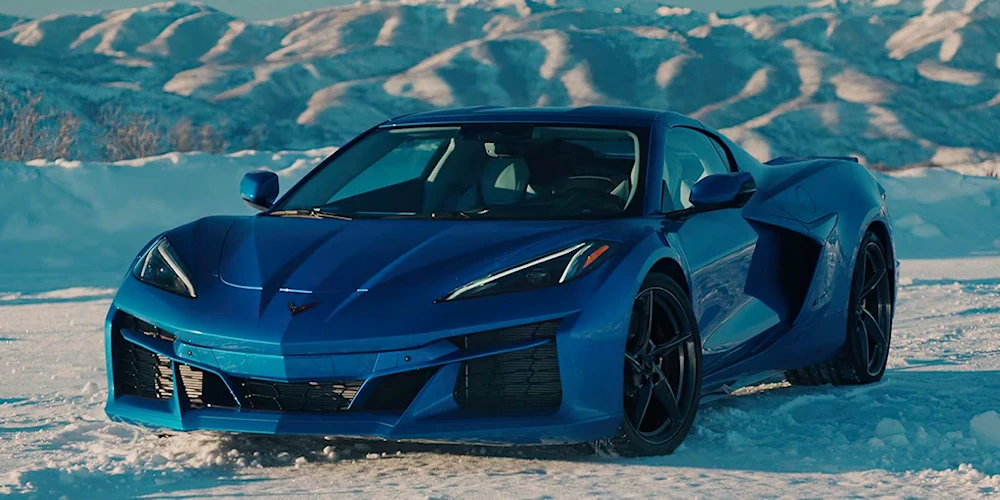 Blue Chevrolet Corvette E-Ray in manufacturer exterior photography