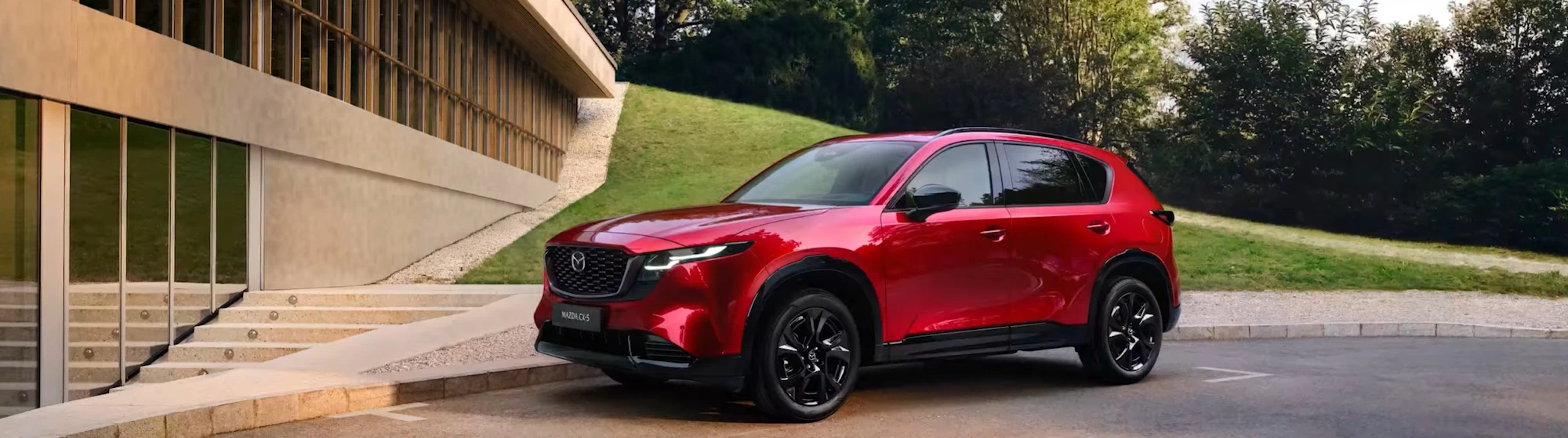 All-new Mazda CX-5 family SUV driving through a city