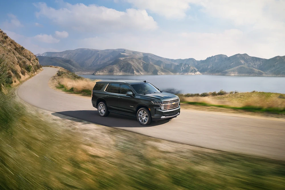 Chevrolet Tahoe driving on a coastal road
