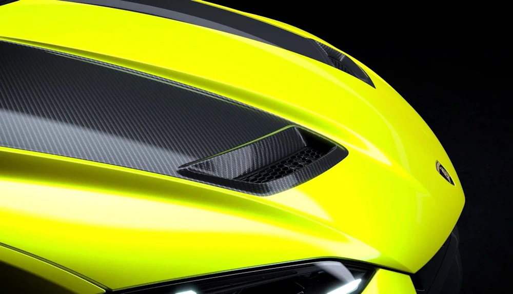 Carbon-fibre bonnet detail on a yellow Lamborghini Urus SE Performante