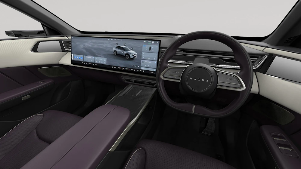 Right-hand-drive Mazda CX-6e Takumi Plus dashboard with central touchscreen and digital side-mirror display