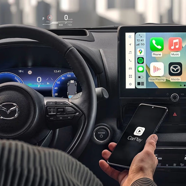 Mazda2 Hybrid touchscreen and steering wheel with smartphone connectivity