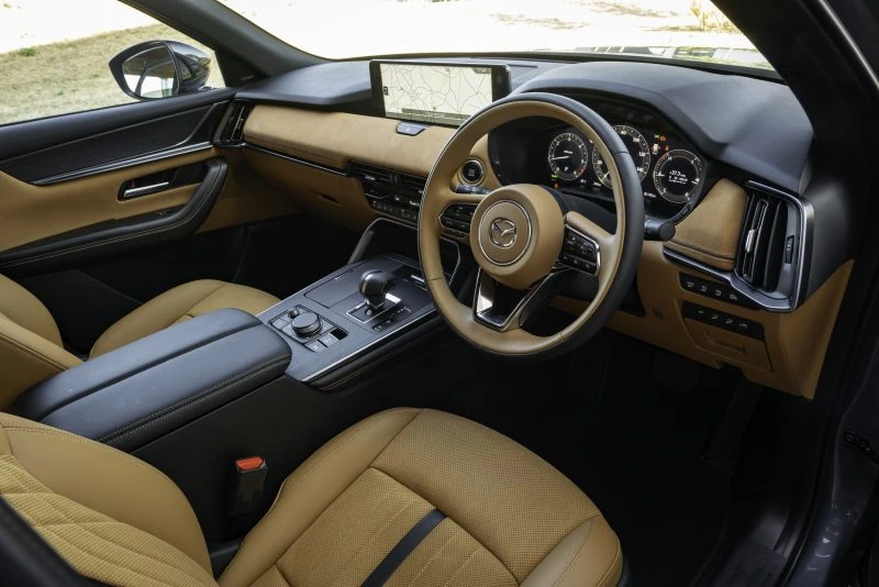 Tan cabin in a 2026 Mazda CX-60 Homura Plus