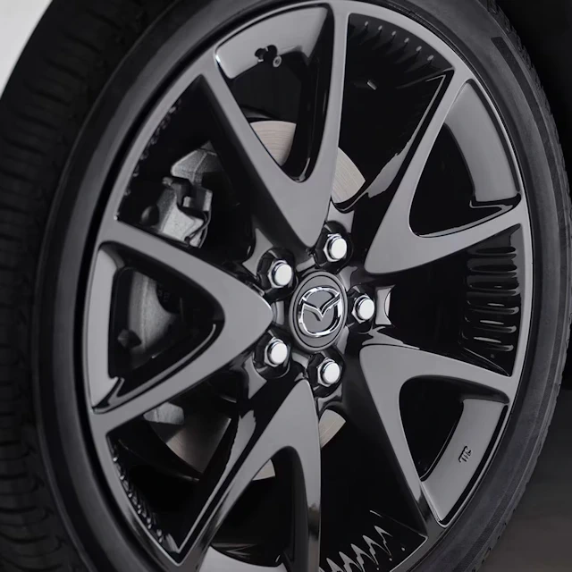 Close-up of a Mazda2 Hybrid alloy wheel