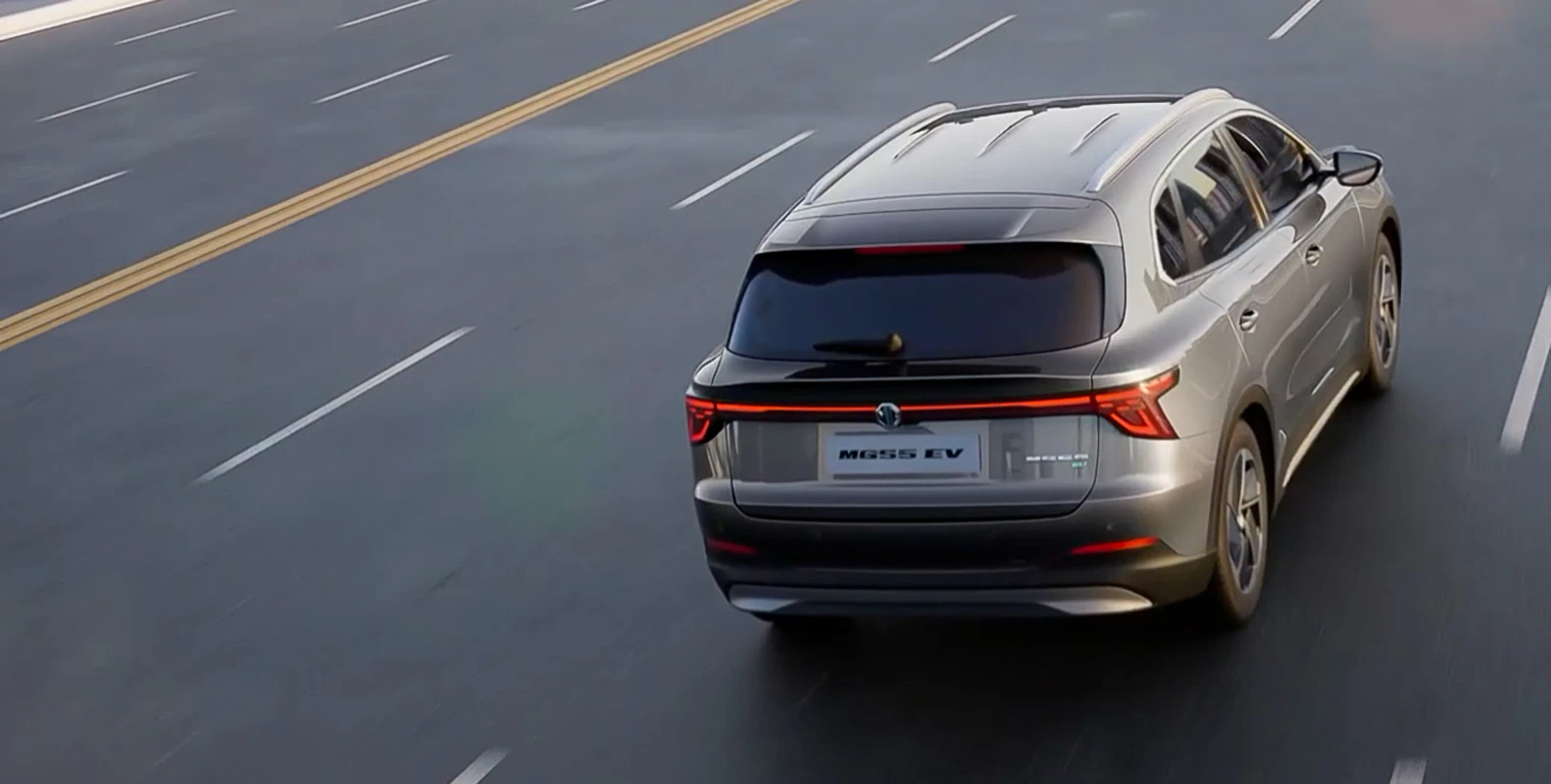 MGS5 EV driving on a road viewed from above and behind