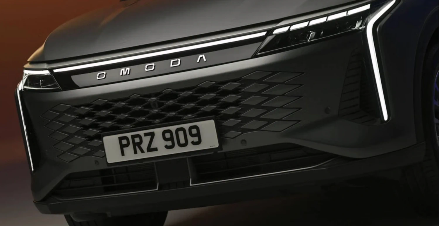 OMODA 9 flagship SUV parked in a city