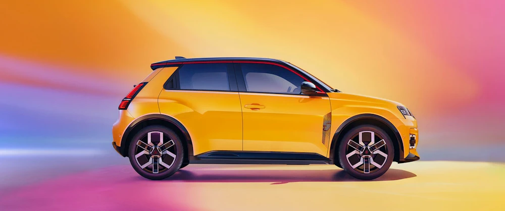 Yellow Renault 5 E-Tech electric shown in side profile