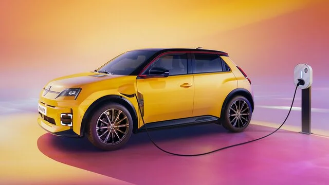 Renault 5 connected to a home charging point