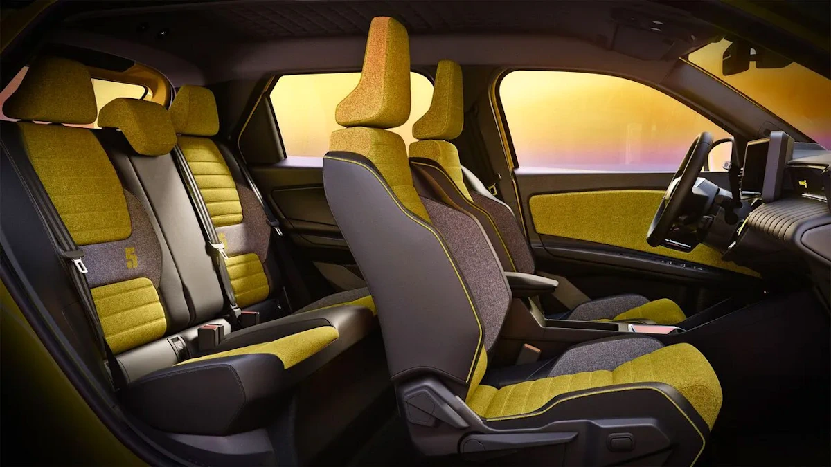 Renault 5 E-Tech electric front cabin with grey and yellow seats