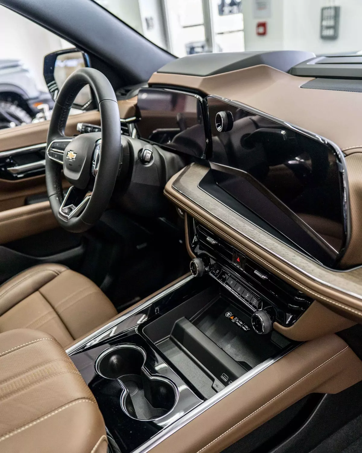 Suburban left-hand-drive cockpit with its central touchscreen and console
