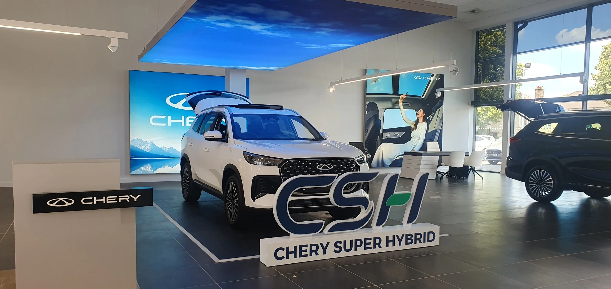 Inside the new Invicta Chery Croydon showroom with Chery Super Hybrid display